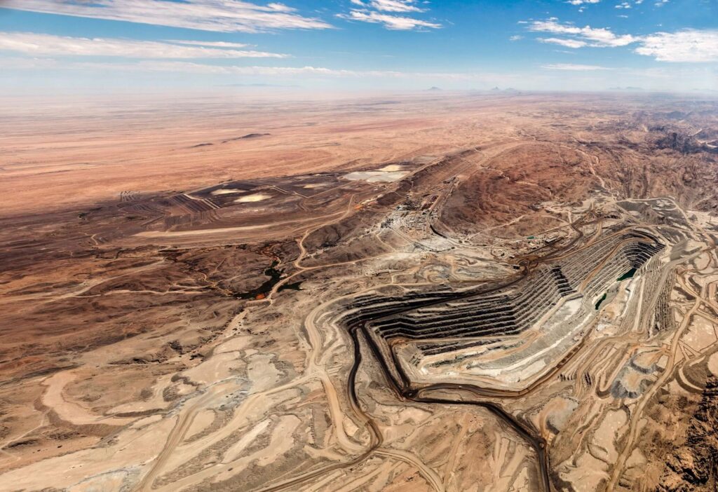 Rössing Uranium has produced uranium yellow cake from Rössing mine since 1976. It has been a cornerstone of Namibia's mining industry since 1976, supplying uranium to the global nuclear energy sector.